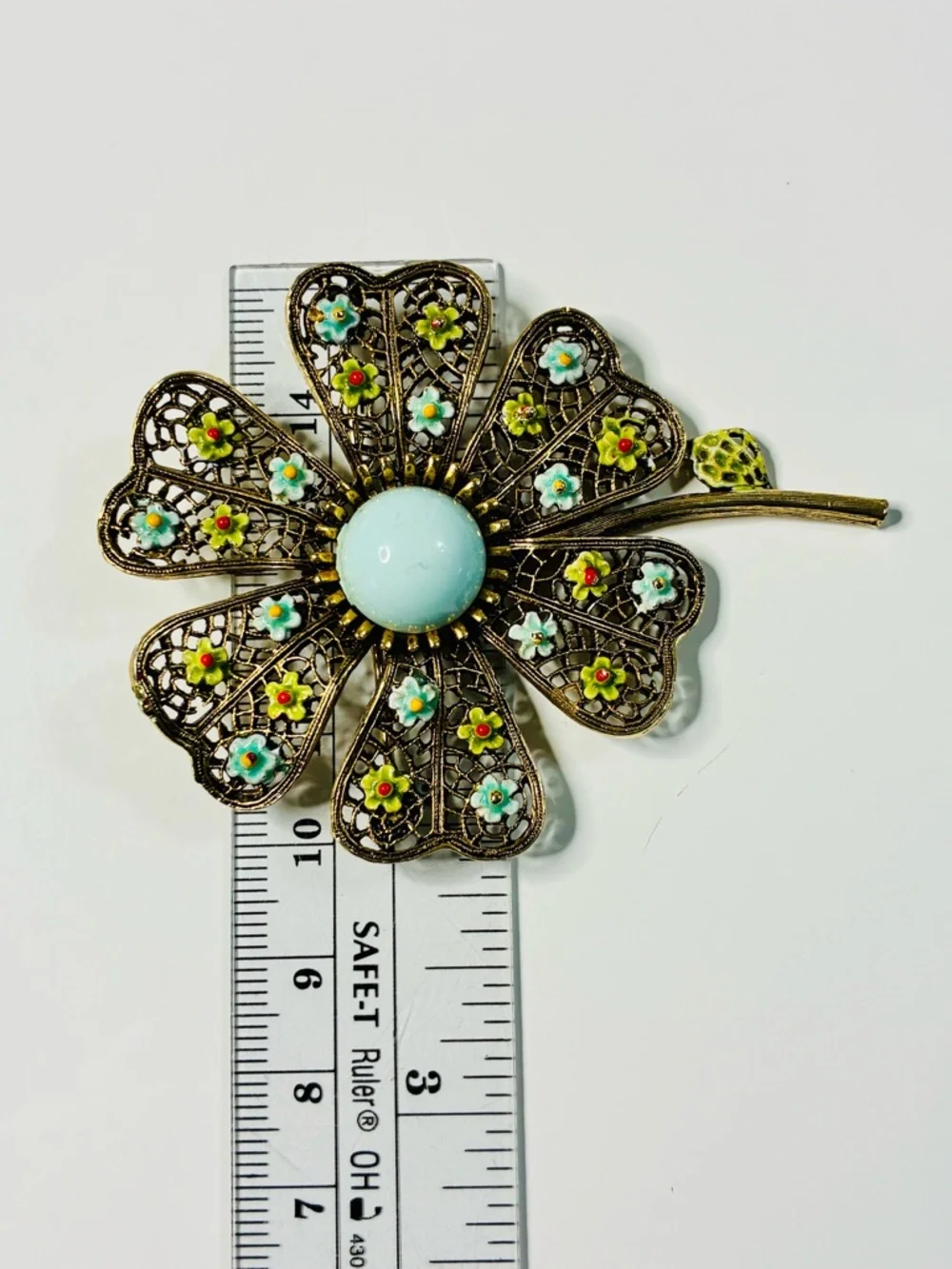 VTG Art Floral Filigree Flower Brooch with Pale Blue Cabochon Signed Oversized